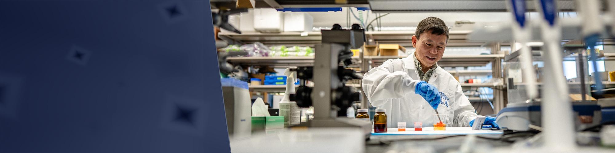 Dr. Bing Yu working in Biophotonics Lab, Marquette-MCW Joint Department of Biomedical Engineering