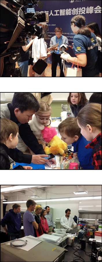 Dr. Bing meets with the press after a conference in China. 