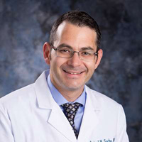 Headshot of Dr. Raphael Sacho