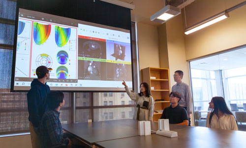 Dr. Fan lectures undergraduate researchers at Marquette's Engineering Hall