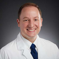 Headshot of Dr. Max Krucoff