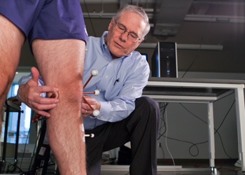Dr. Gerald Harris working in orthopaedics lab