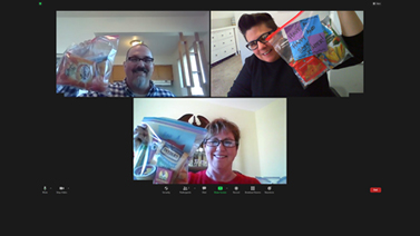 BME Administrative staff members Denise Ron, Meg Kuacic and Jeff King preparing SnackPacks for local Milwaukee students. 