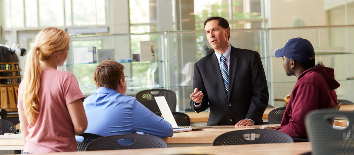 Dr. Jay Goldberg speaks with undergraduate students