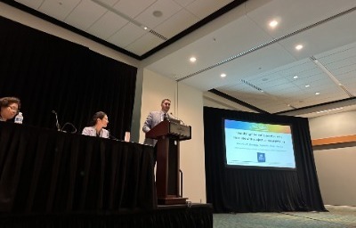 Hamdan presenting at AAO-HNSF 2023